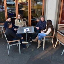 Students at Cheeseboard Pizza